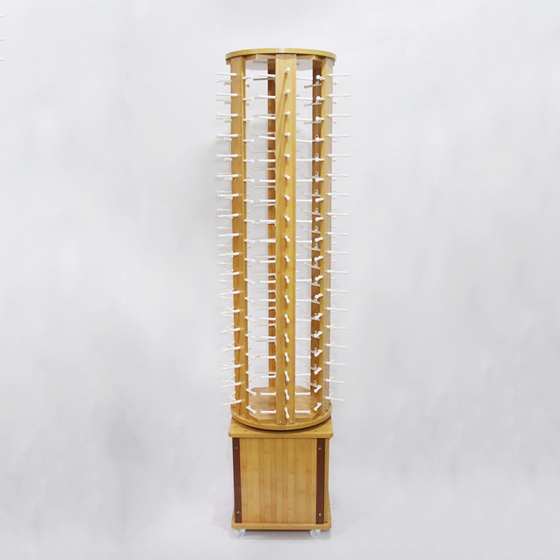 Lacquered floor-to-ceiling rotating glasses display stand