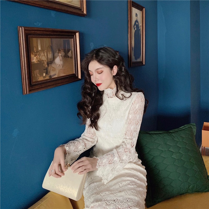 The new summer 2020 exquisite lace dress for women is a pearl white dress with flared sleeve and stand-up collar