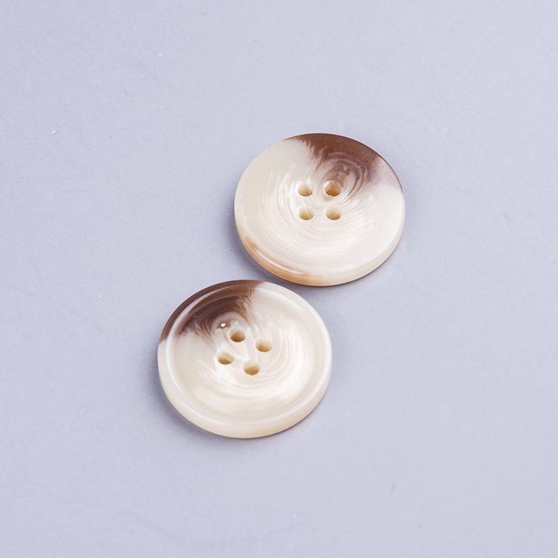 Resin four-eye button